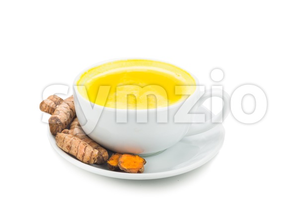 Turmeric with milk drinks good for beauty and health. Stock Photo