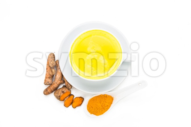 Turmeric with milk drinks good for beauty and health. Stock Photo