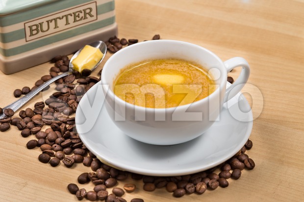 Coffee with added milk and butter, the new diet that favors high fats low carbo called ketogenic diet Stock Photo