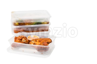 Convenient but unhealthy disposable plastic lunch boxes with meals Stock Photo