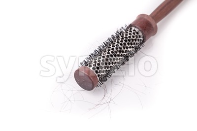 Comb with strand of hair on white background Stock Photo