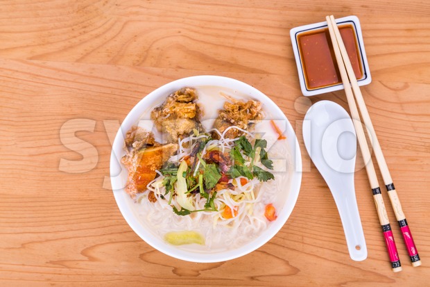 Rice vermicelli fried fish head noodle soup, delicacy  in Malaysia Stock Photo