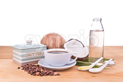 Bulletproof coffee with virgin coconut oil and organic butter Stock Photo