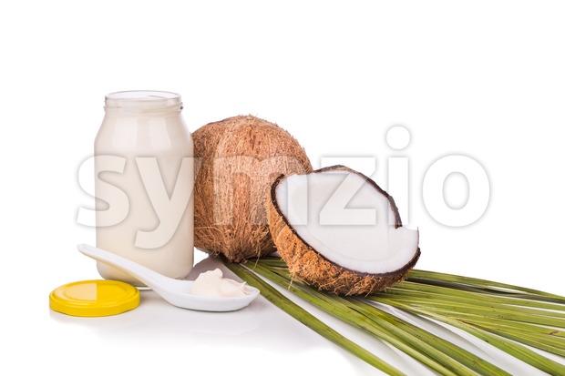 Jar containing coconut oil are used as cooking ingredient Stock Photo