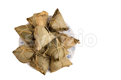 Bunch of traditional Duanwu Chinese rice dumplings isolated on white Stock Photo