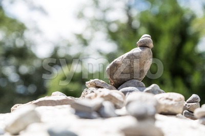 Closeup of Zen rock arrangement with nature background Stock Photo
