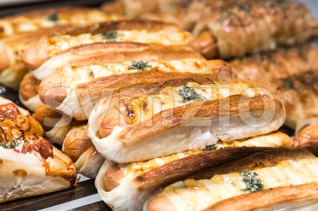 Tray of freshly baked gluten free bread with sausage cheese Stock Photo
