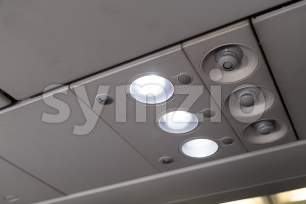 Aircraft cabin reading light and air-con blower Stock Photo