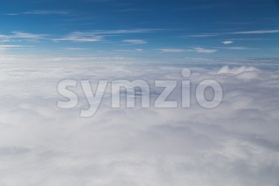 Scenic beautiful cloudscape view from plane window Stock Photo