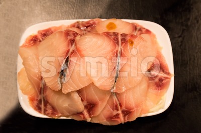 Fish fillet as ingredient for cooking on plate Stock Photo