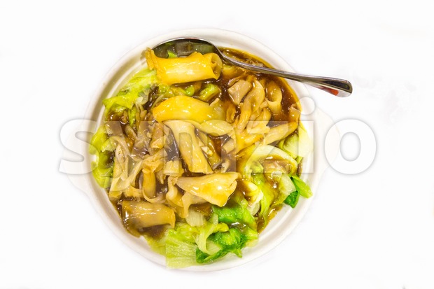 Chinese delicacy braised fish maw with vegetable served in bowl Stock Photo