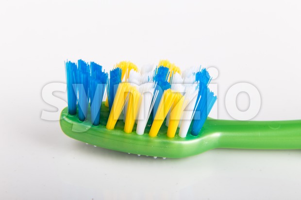 Closeup of toothbrush with uneven round tip bristle Stock Photo