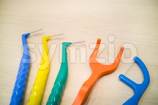 Various type of floss and inter-dental brushes Stock Photo