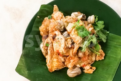 Asian delicious fried oysters with eggs omelette cuisine Stock Photo
