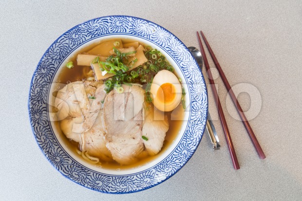 Delicious authentic Japanese Ramen with Pork and Egg in bowl Stock Photo