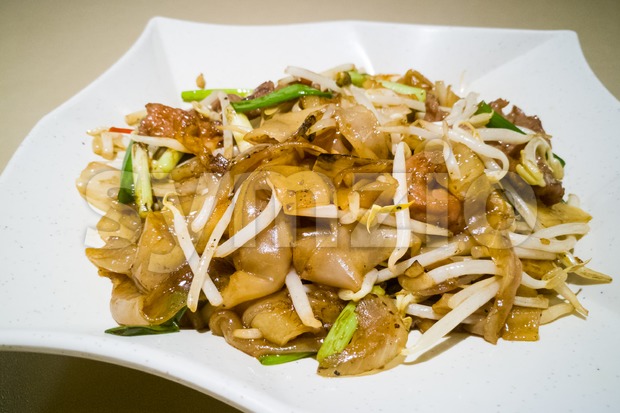 Fried Kuey Teow with beef, popular in Malaysia Stock Photo