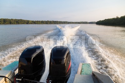 Wave generated by speed boat twin engine in river Stock Photo