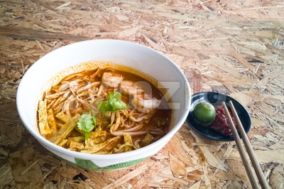 Authentic Sarawak laksa noodle with prawn and egg strips Stock Photo