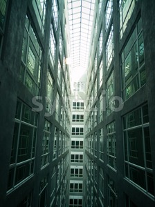 Series of narrow claustrophobia courtyard with glass window Stock Photo