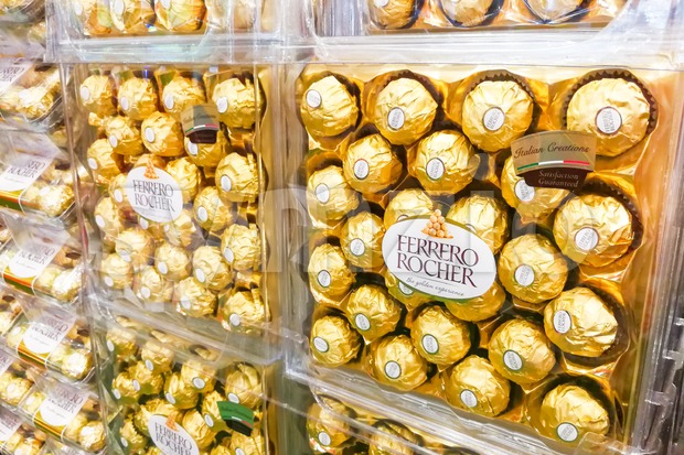 KUALA LUMPUR, Malaysia, June 3, 2017: Ferrero Rocher is a spherical chocolate produced by the Italian chocolatier Ferrero SpA. It is popular as Stock Photo