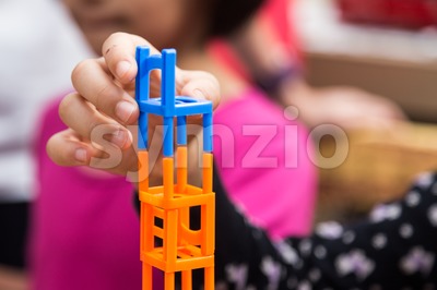 Kids playing the stacking chairs game during party Stock Photo