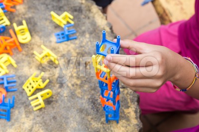 Kids playing the stacking chairs game during party Stock Photo