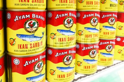 KUALA LUMPUR, Malaysia, June 25, 2017: Ayam Brand or Ayam is a prepared food company based in Singapore. Ayam Brand produces over 60 million cans of Stock Photo