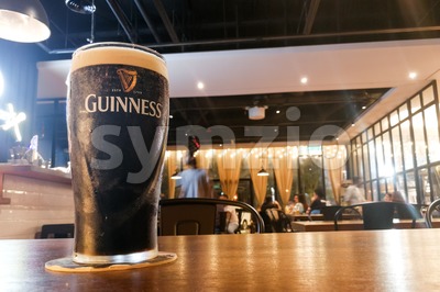 Kuala Lumpur, Malaysia, July 1, 2017:  Guinness is an Irish dry stout that originated in the brewery of Arthur Guinness at St. James's Gate brewery, Stock Photo