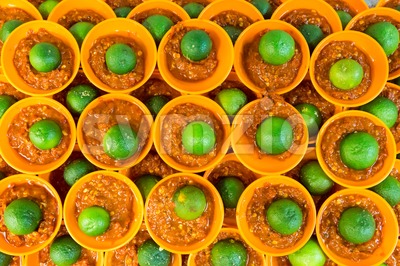 Spicy chili sambal belacan with calamansi lime in mini saucer Stock Photo