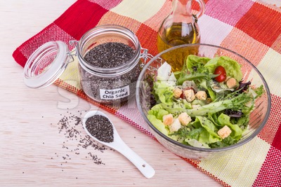 Organic chia seeds with salad healthy meal loaded with antioxidant Stock Photo