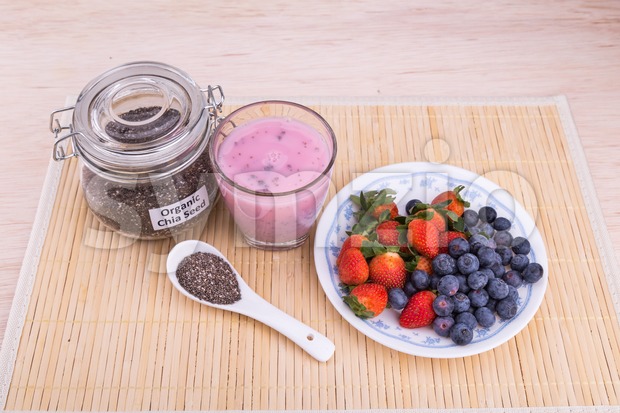 Chia seeds with fresh berries juice, healthy nutritious anti-oxidant drinks Stock Photo