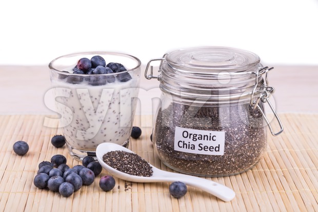 Chia seeds pudding with blueberry fruits, healthy nutritious anti-oxidant superfood. Stock Photo