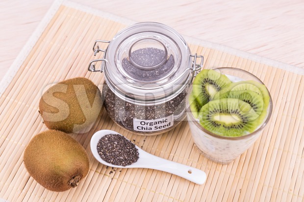 Chia seeds pudding with kiwi fruits, healthy nutritious anti-oxidant superfood. Stock Photo