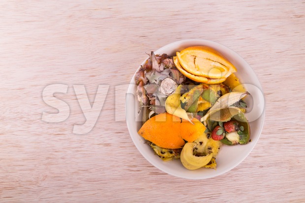 Bowl of household vegetable and fruits refuse collected for compost Stock Photo