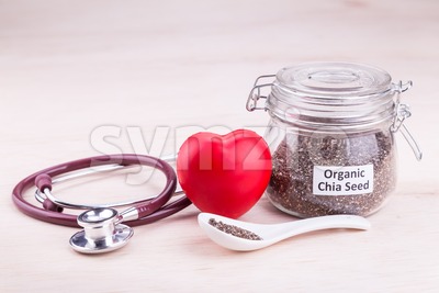 Chia seeds superfood contains healthy omega-3, carbohydrates, protein, fiber, antioxidants. Stock Photo