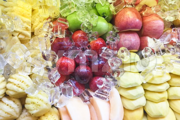 Fresh and refreshing sliced fruits variety neatly arranged Stock Photo