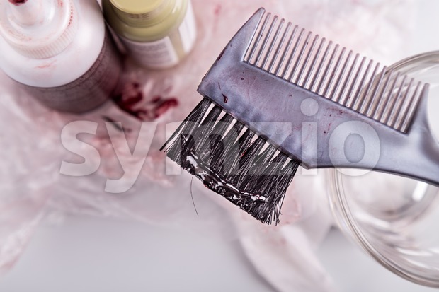 Close-up of chemical hair color dye set with comb brush Stock Photo