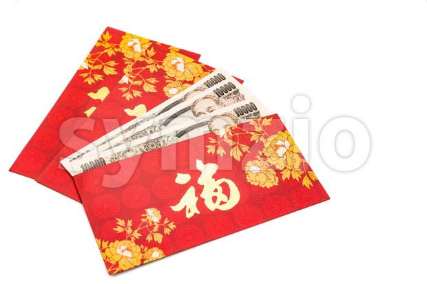 Red packet with Good Fortune character contains Japanese Yen currency Stock Photo