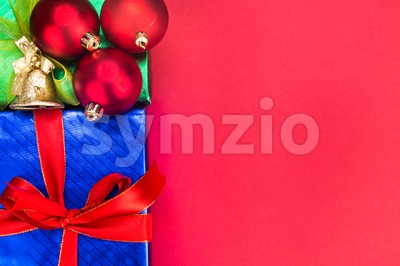 Colourful Christmas background decorated with gift boxes and ribbons. Stock Photo