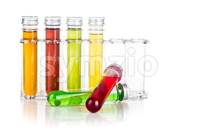 Test tubes with multi color chemicals isolated in white Stock Photo